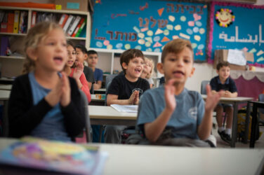 KAFR QARA, ISRAEL--OCTOBER 15: Lessons are taught simultaneously in Hebrew and Arabic to both Jewish and Arab Israeli children at the Wadi Ara Hand in Hand School on October 15, 2016 in Kafr Quara, Haifa District of Israel. The Hand in Hand educational School concept started in 1997 by Amin Khalaf, an Arab teacher and lecturer, and Lee Gordon, a Jewish-American social activist, after they met while working in their respective fields promoting Arab-Jewish dialogue in Israel. The schools they pioneered host an equal number of Jewish and Arab students respectively. Two teachers speak simultaneously in both Arabic and Hebrew while teaching the lesson. Judaism, Islam and also Christianity are taught with equal weight to all students, and each faith's respective religious holidays are also observed. Emphasis is given not only to one's own culture and language but also to those of the 